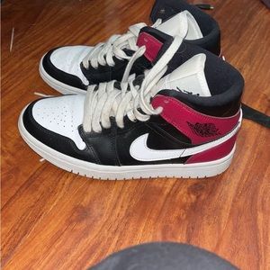 I am selling Jordan 1 Mid Noble Red 7